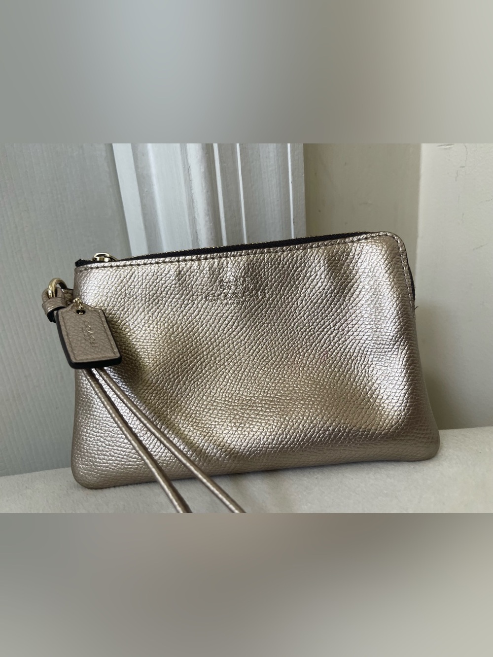 Coach Metallic Leather Wristlet Clutch in Champagne